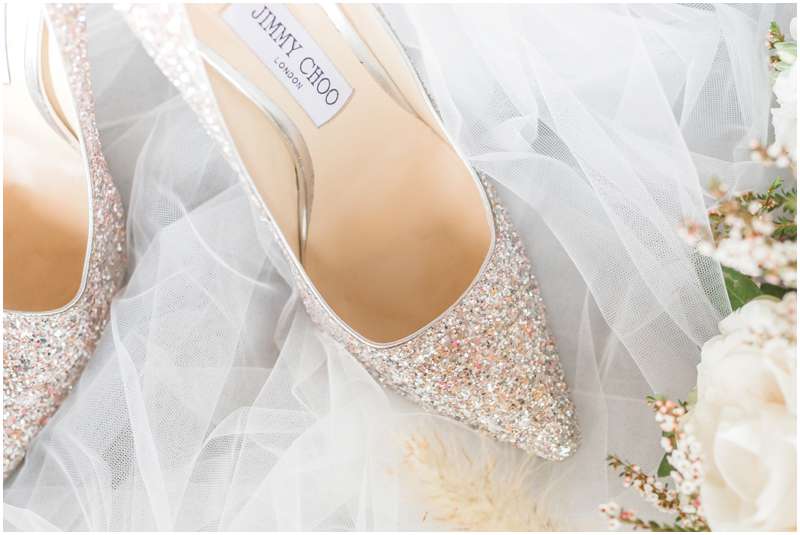 Carrie McGuire photography Temecula photographer Jimmy Choo sparkley shoes on bridal veil Tucson Arizona Wedding photographers