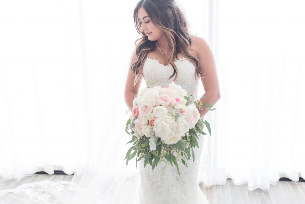 bride with bouquet in bridal gown Lakehouse San Marcos Carrie McGuire Photography Temecula Wedding Photography