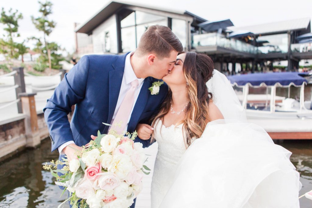 bride and groom kissing Lakehouse San Marcos Carrie McGuire Photography Temecula Wedding Photography