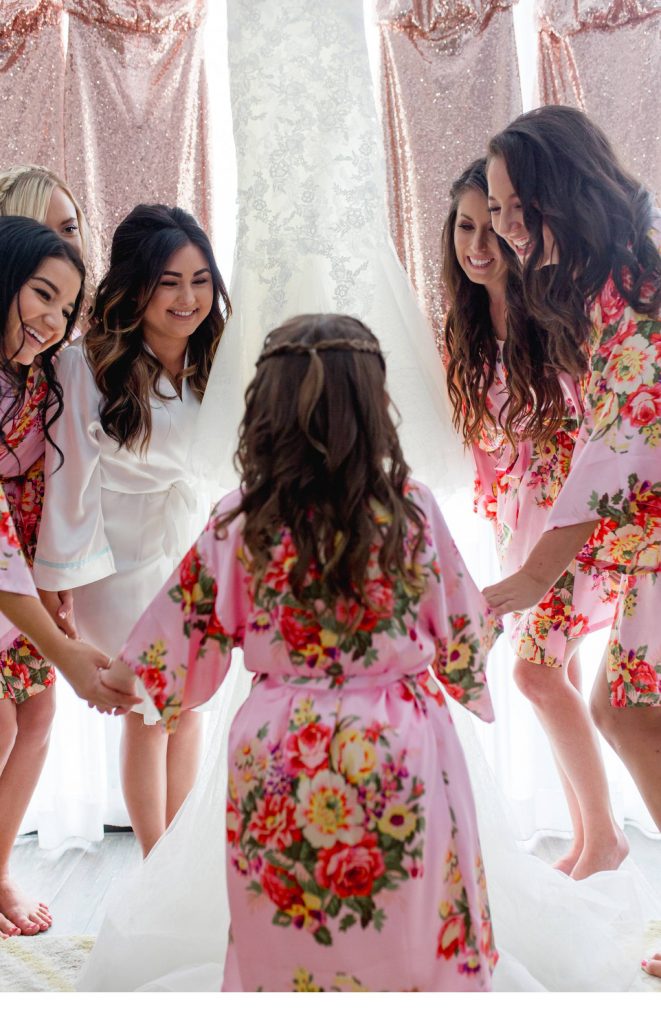 Bride and bridesmaids with flower girl and gowns Lakehouse San Marcos Carrie McGuire Photography Temecula Wedding Photography