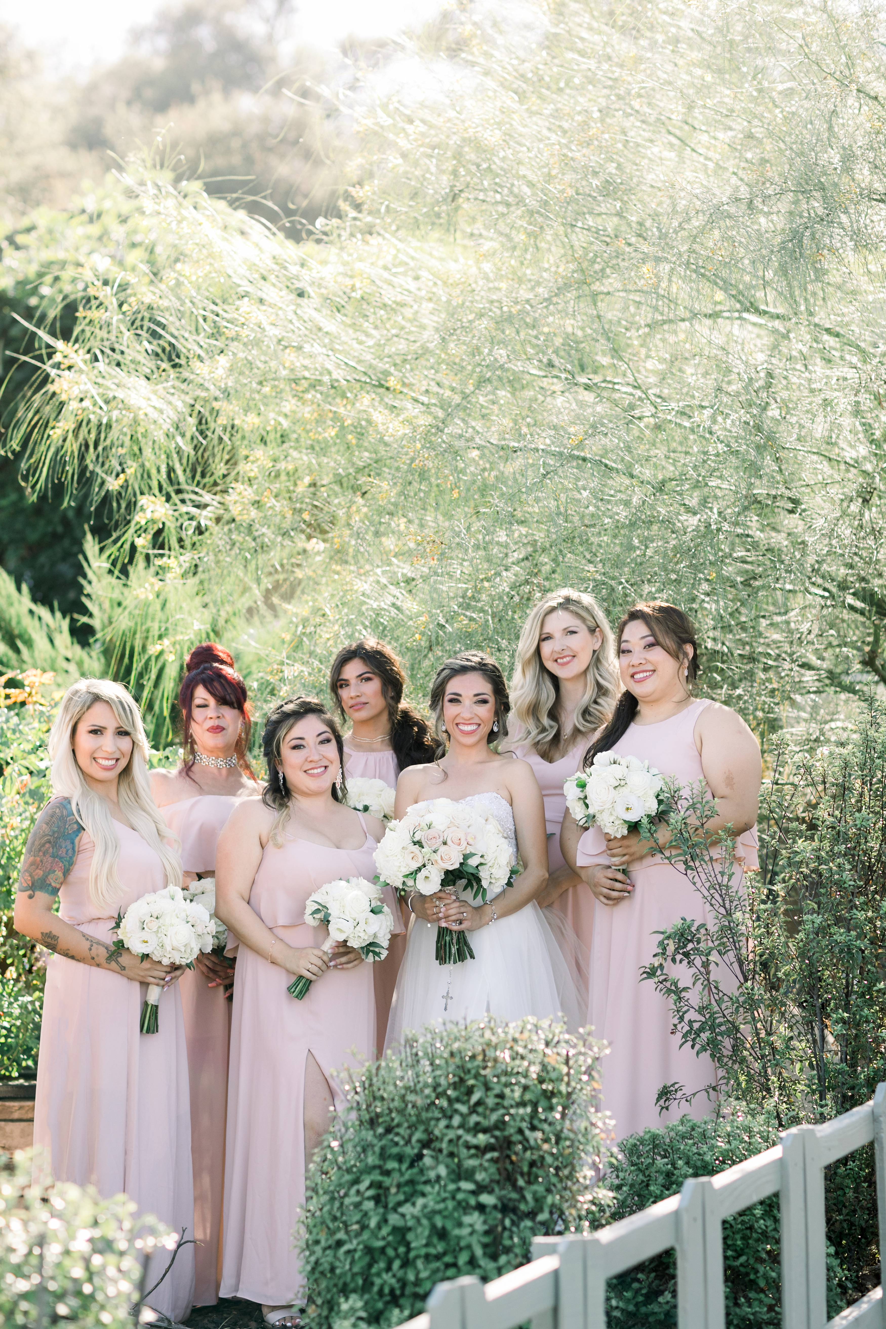 Bridesmaids with lush background in southern california 
