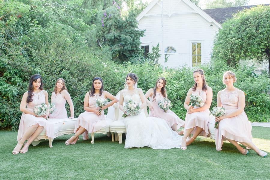 bride and bridesmaids in green garden Temecula wedding photographer Carrie McGuire Photography