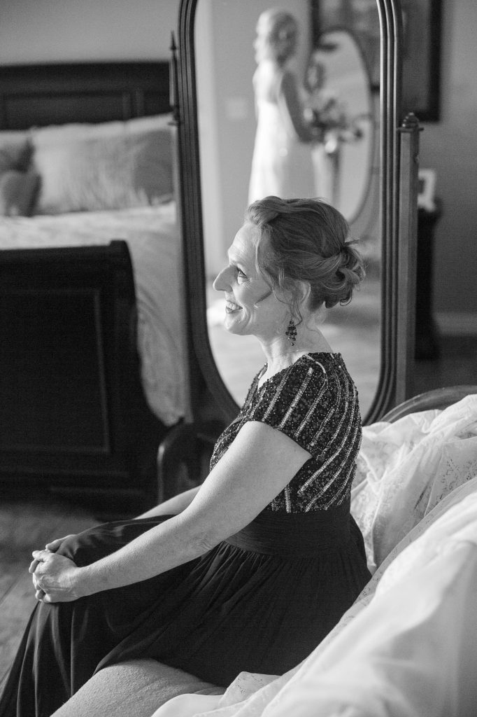 black and white bridesmaid and bride in mirror reflection Meadowview backyard wedding Carrie McGuire Temecula wedding Photography 