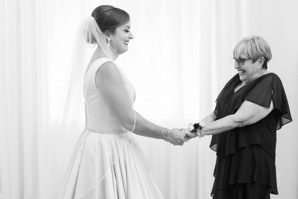 black and white photo of mother of the bride and bride before ceremony forever and always farm temecula wedding engagement photography Carrie McGuire photographer california