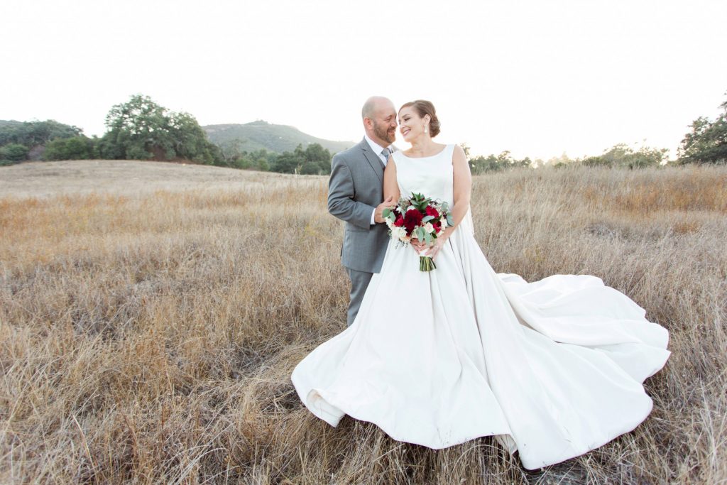 groom and bride together in field sunset forever and always farm temecula wedding engagement photography Carrie McGuire photographer california