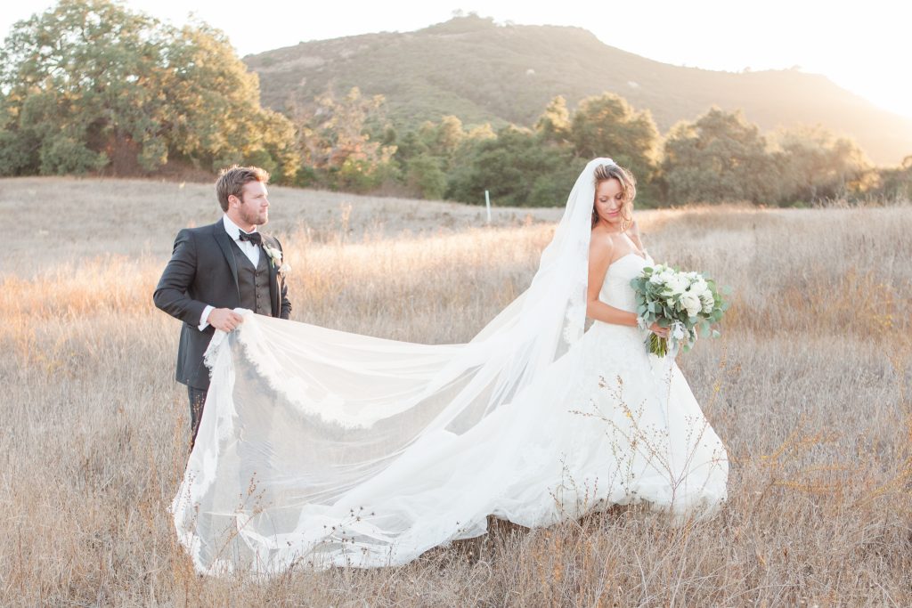 groom and bride in field forever and always farm temecula wedding engagement photography Carrie McGuire photographer california