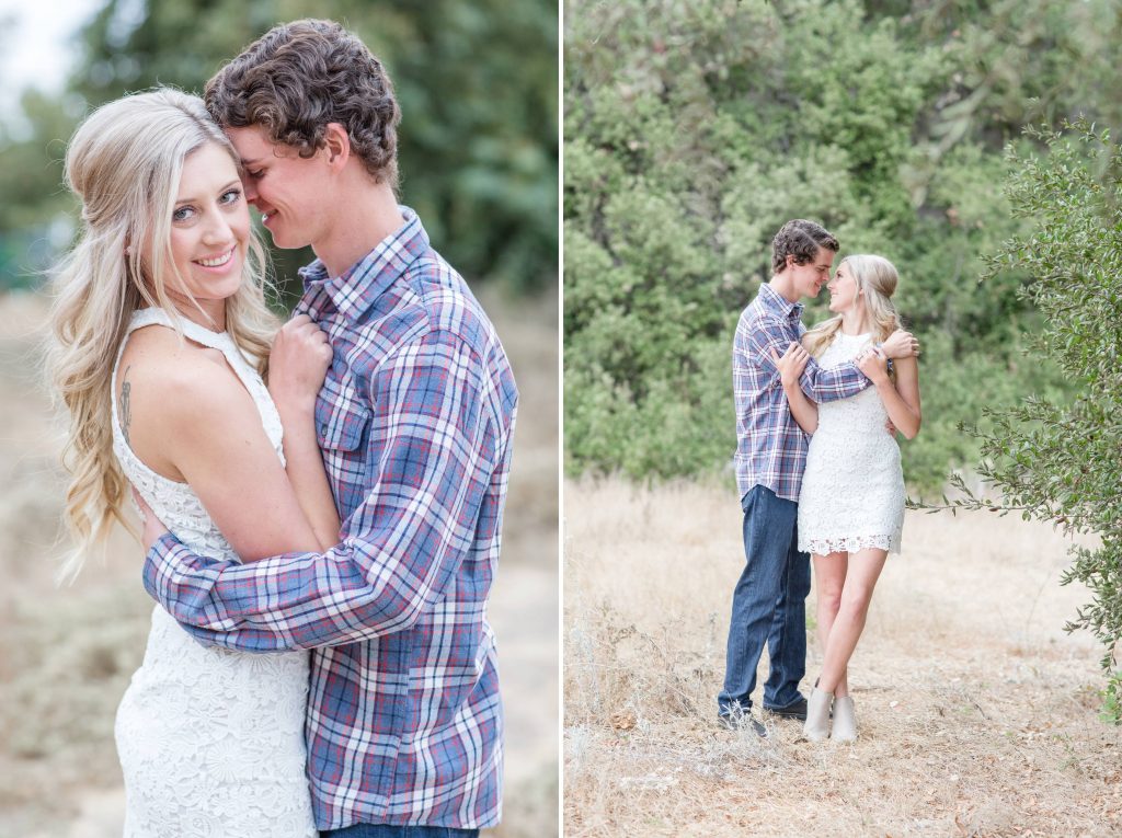 adorable couple hugging in field Thomas f Riley wilderness park Orange County California wedding engagement maternity photography Carrie McGuire photographer California