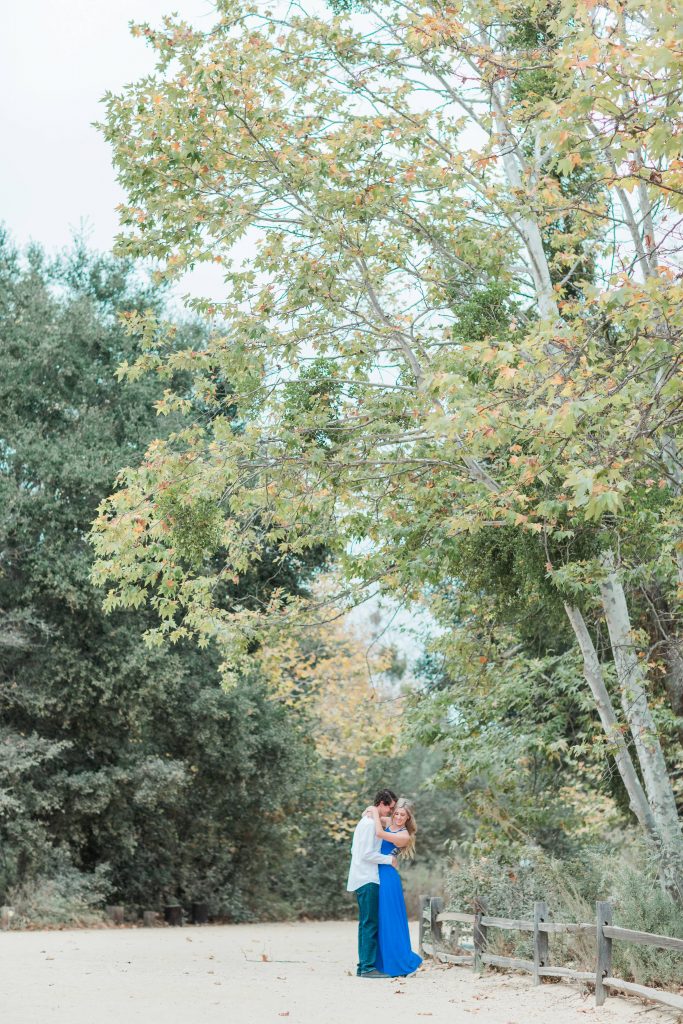 young couple with tree Thomas f Riley wilderness park Orange County California wedding engagement maternity photography Carrie McGuire photographer California