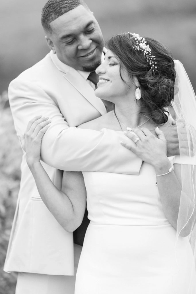 Black and white photo of happy bride and groom Forever and always farm Temecula California wedding engagement family maternity photography Carrie McGuire photographer