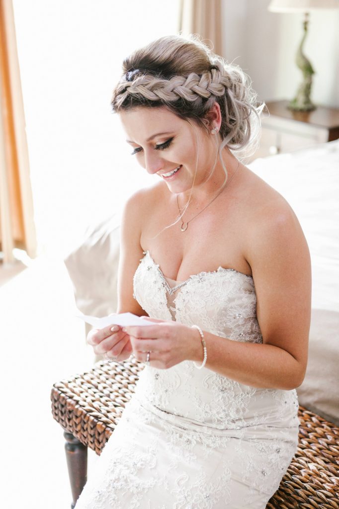 bride reading note from groom before wedding Temecula Coachhouse California wedding engagement photography Carrie McGuire photographer California