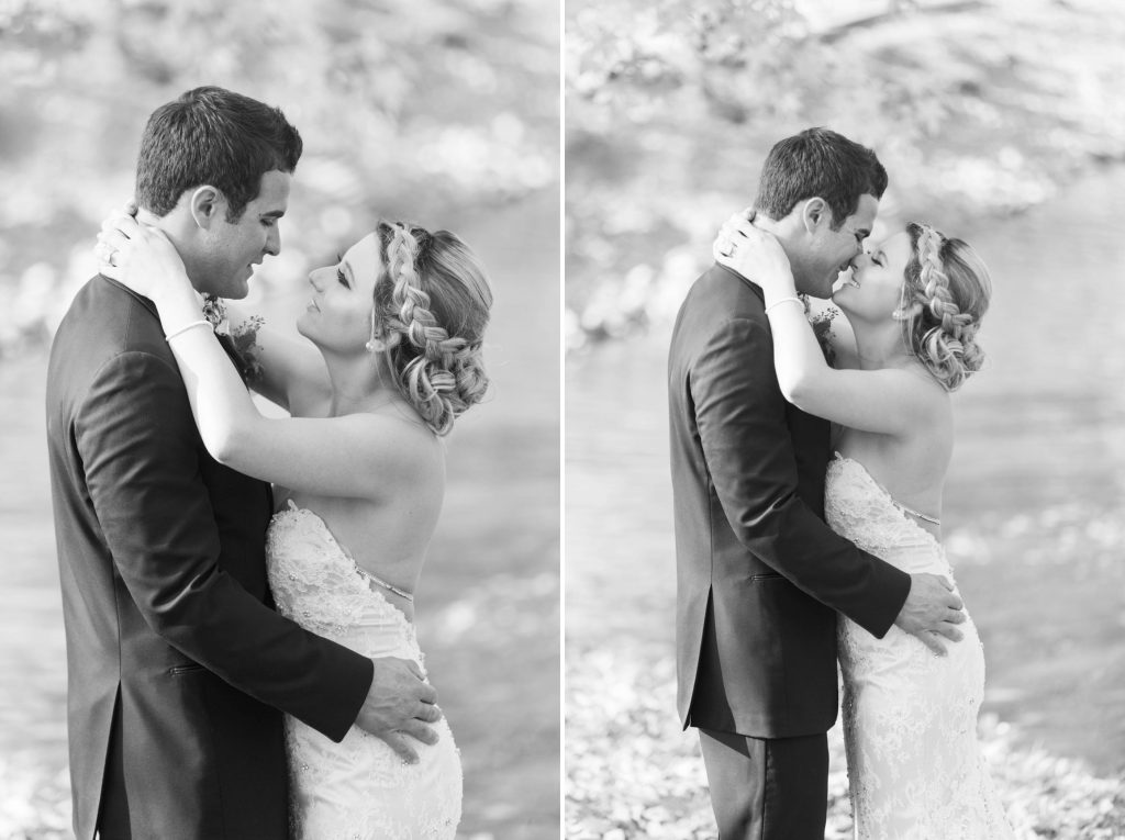 black and white photo of bride and groom hugging and kissing during first look Temecula Coachhouse California wedding engagement photography Carrie McGuire photographer California