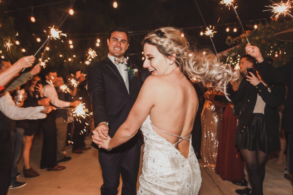 bride and groom under sparklers Temecula Coachhouse California wedding engagement photography Carrie McGuire photographer California
