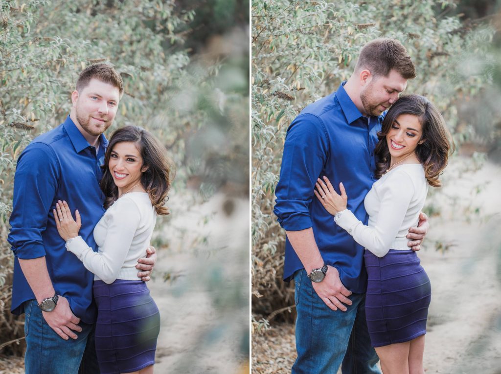 couple holding each other in garden Temecula wedding and engagement photographer session rose heritage gardens California wedding engagement photography Carrie McGuire California