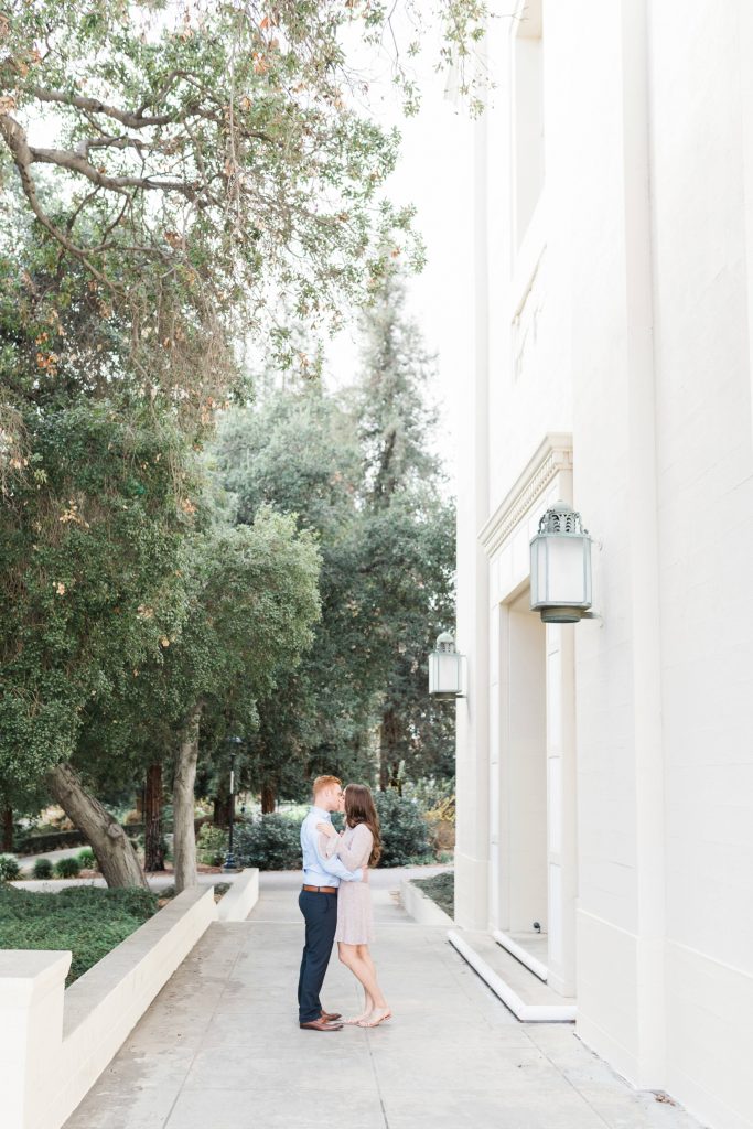 engaged couple at clairmont pomona college engagement session Temecula wedding photography engagement photos Carrie McGuire Photographer