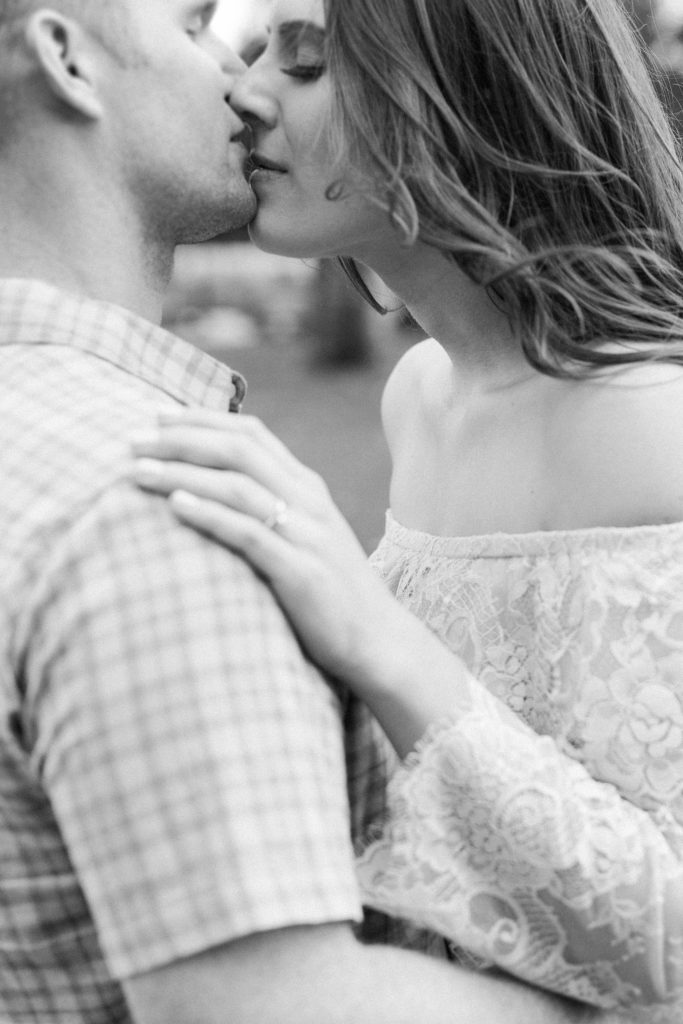 engaged couple kissing at clairmont pomona college engagement session Temecula wedding photography engagement photos Carrie McGuire Photographer