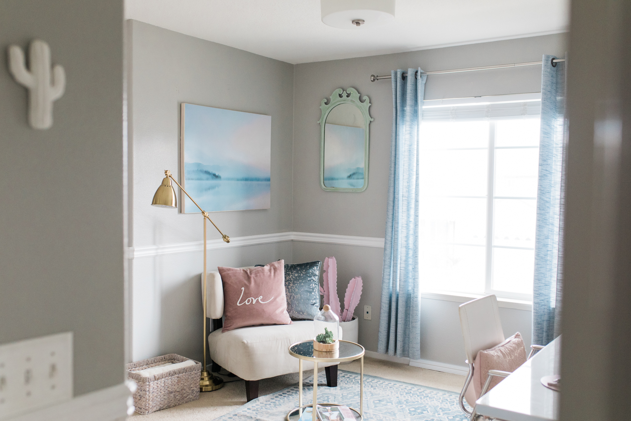 light bright and airy photographer office with soft pops of pink and blue