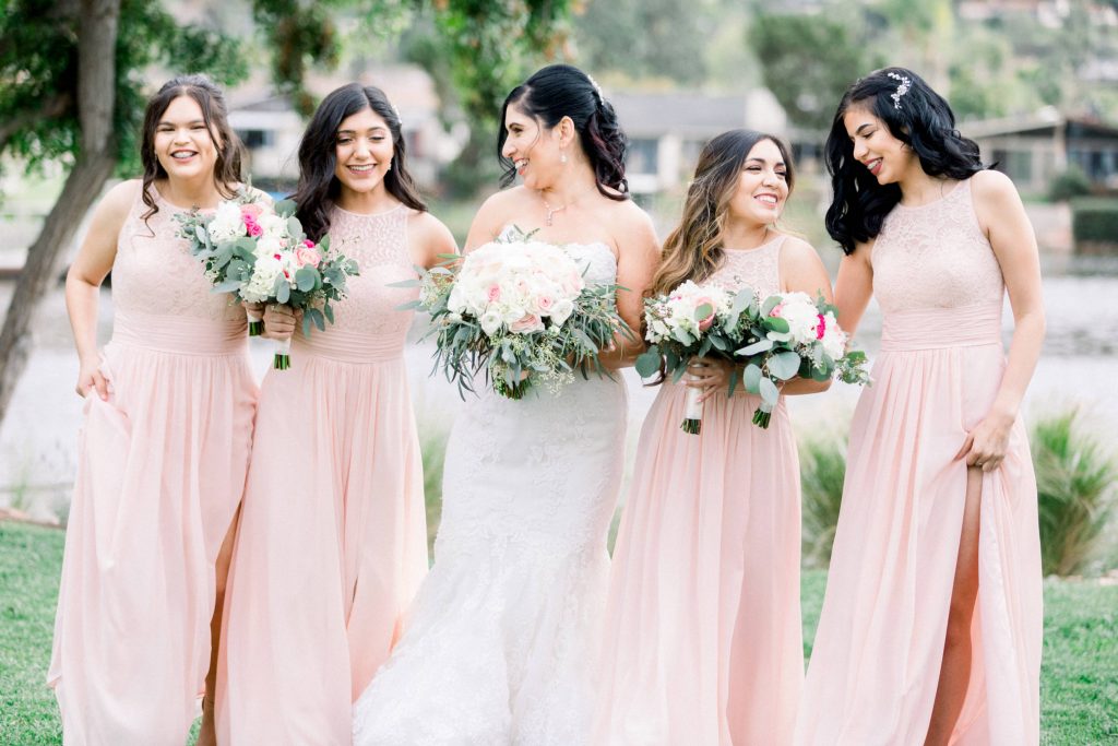 bride and her happy bridesmaids with bouquets Lakehouse Resort San Marcos Rachel and Steven Temecula California wedding engagement photography Carrie McGuire photographer California