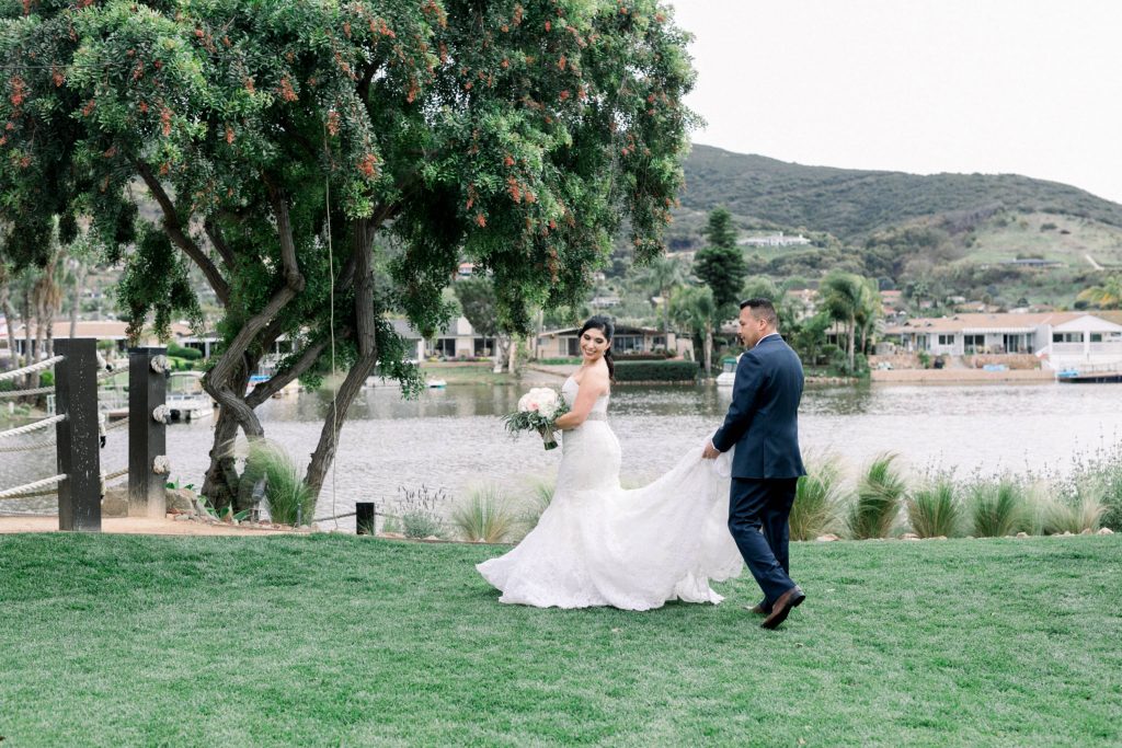 bride and groom lake side first look Lakehouse Resort San Marcos Rachel and Steven Temecula California wedding engagement photography Carrie McGuire photographer California