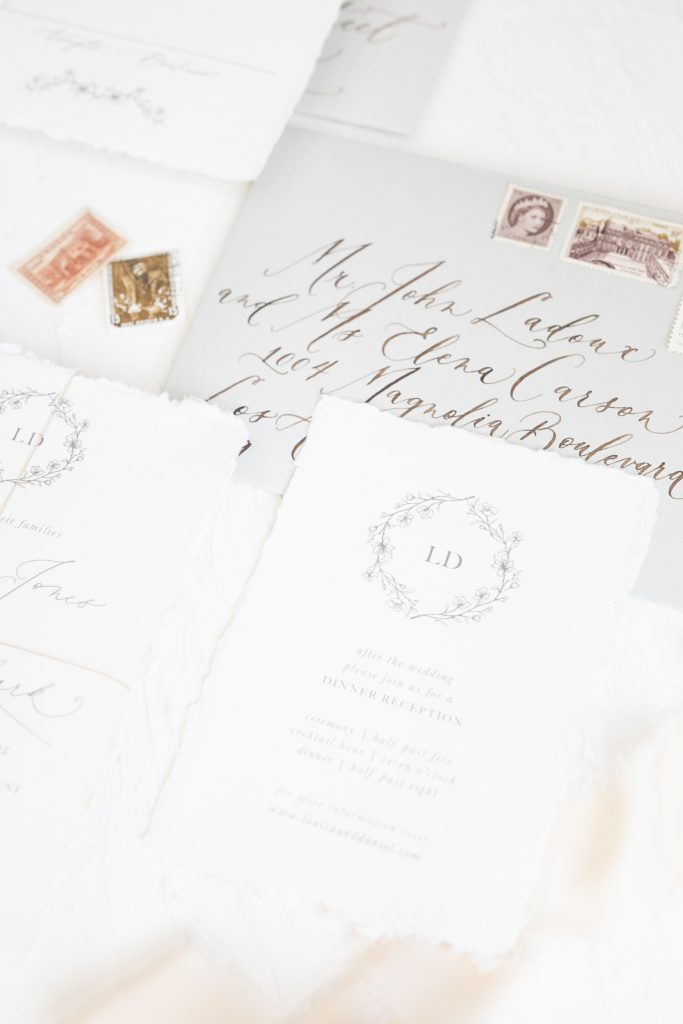 Elegant custom made wedding invitations with vintage details